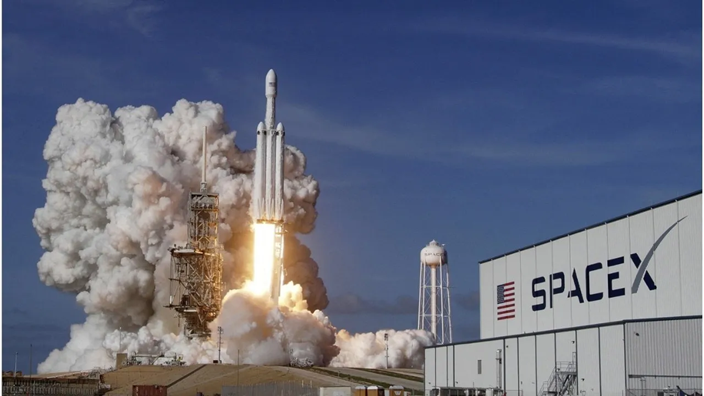 SpaceX’s Falcon Heavy rocket lifts off from Kennedy Space Center in Florida last year.
(Red Huber / Associated Press)